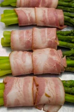Asparagus with bacon Stock Photos