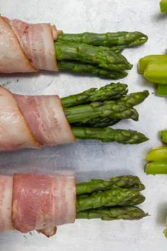Asparagus with bacon Stock Photos