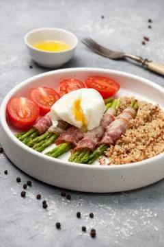 Asparagus with bacon Stock Photos