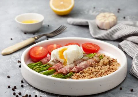 Asparagus with bacon Stock Photos