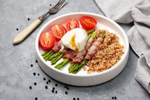 Asparagus with bacon Stock Photos