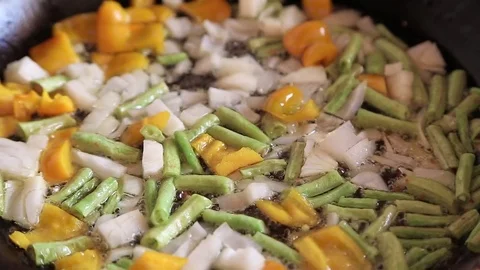 Asparagus beans in a frying pan 스톡 동영상 78608780