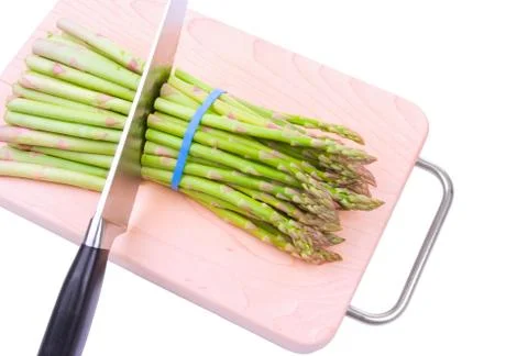 Asparagus cut with a knife Stock Photos