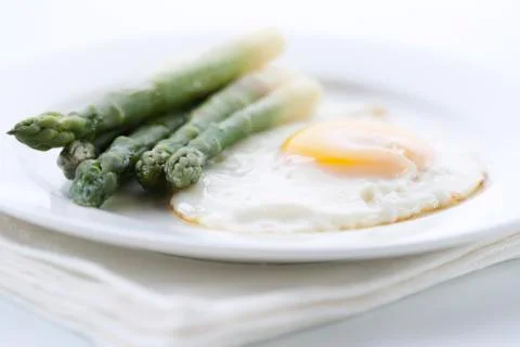 Asparagus with eggs Stock Photos