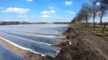 Asparagus field rows panning shot covered with plastic plane at sunny day 4k or 4k+ Resolution