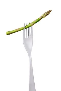 Asparagus on a fork isolated Stock Photos