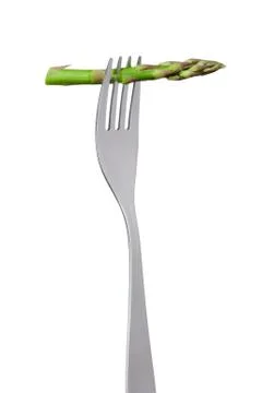 Asparagus on fork Stock Photos