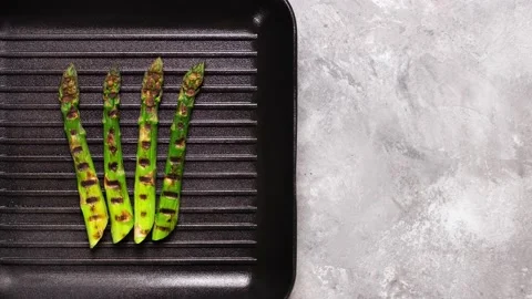 Asparagus on grill pan loop animation. Background with copy space for grocery Stock Footage 130730315