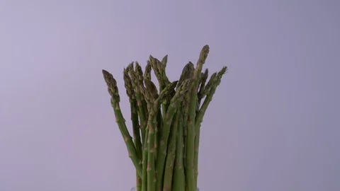 Asparagus Rotating on White Background Video stock 129617928