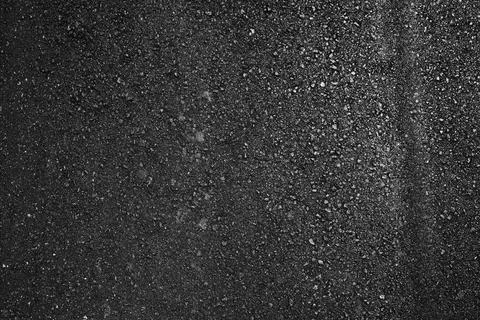 Asphalt background texture high angle view closeup for transport backdrop Stock Photos
