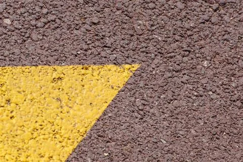 Asphalt background texture with some fine grain with Yellow Stripe Stock Photos