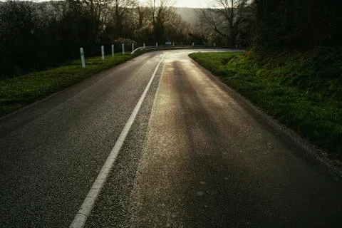 Asphalt empty road passing through the fields in the region of Normandy, France Stock-Fotos