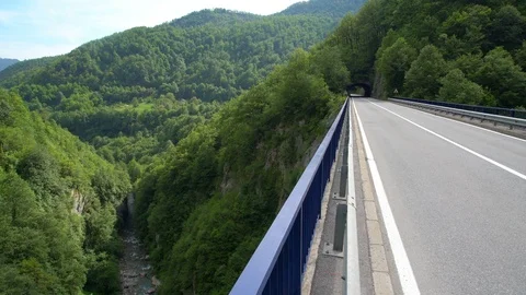 Asphalt highway empty on green forest nature of Montenegro Video stock 119885492