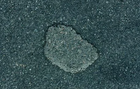 Asphalt with a hole Stock Photos