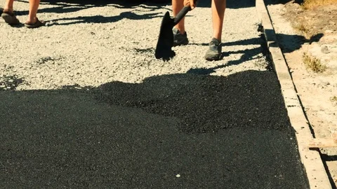 Asphalt laying by manual method 1 Stock Footage 98362033