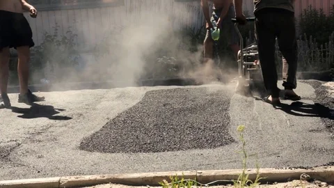 Asphalt laying by manual method 2 Stock Footage 98362083