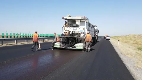 Asphalt laying Workers Road construction Construction works Asphalt machine Stock Footage 231898960