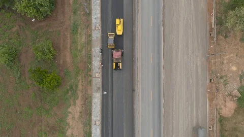 Asphalt machine and steamroller operator job Video stock 88360894
