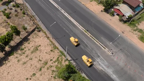Asphalt machine and steamroller operator job 스톡 동영상 93237618