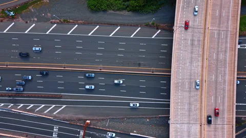 Asphalt multi-lane highways with fast moving cars. Top view. Footage from drone Stock Footage 342453764
