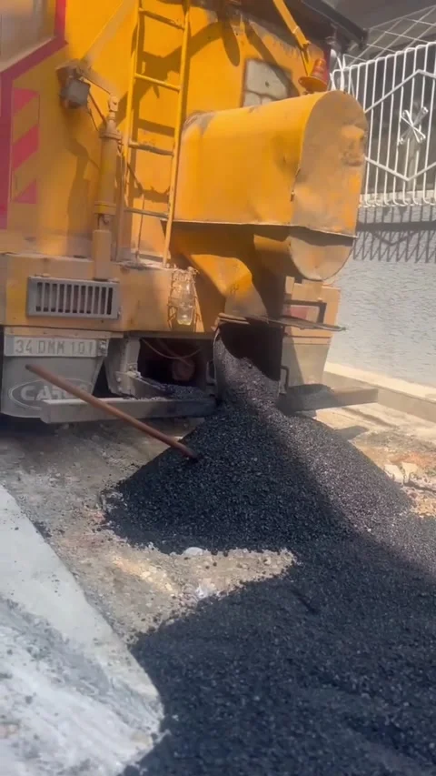 Asphalt Patching Robot Applying Hot Asphalt Stock Footage 323654764