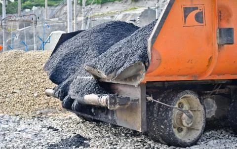 Asphalt paver machine closeup Stock Photos