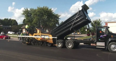 Asphalt Paver Moving Forward - Working - Blue Sky Stock Footage 78553580