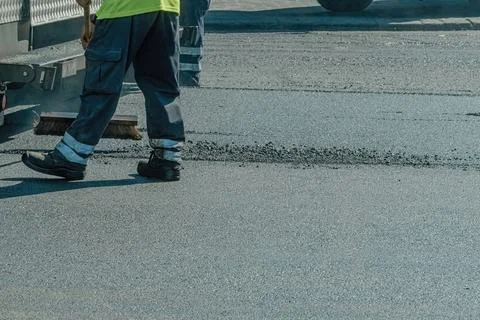 Asphalt paver at work close up Fotos de archivo