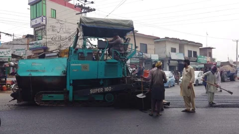 Asphalt Paver Working On Road In Khushab, Pakistan. 7 Jun 2026 Stock Footage 336744990