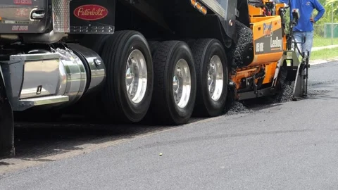 Asphalt paving machine placing a layer of Asphalt  1 Stock Footage 276300868