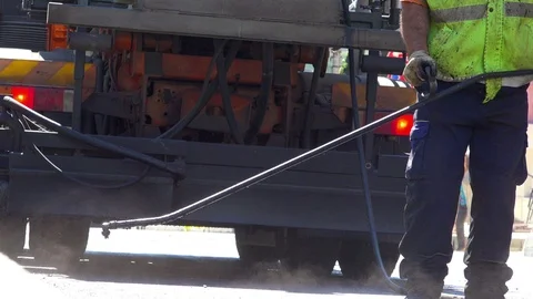 Asphalt paving worker Stock Footage 89451417