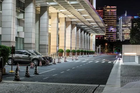 Asphalt road and modern commercial building landscape in Shanghai. Stock Photos