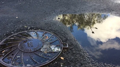 Asphalt road and puddle Stock Footage 97263450