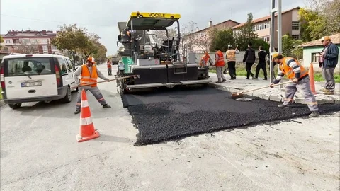 Asphalt road construction Vídeo Stock 82857605