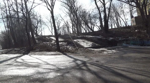 Asphalt road in the early spring sunshine Stock Footage 36036352
