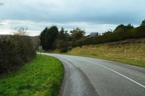 Asphalt road passing through the fields in the region of Normandy, France Stock-Fotos
