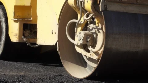 Asphalt road roller heavy vibration compactor work construction site Stock Footage 251890440