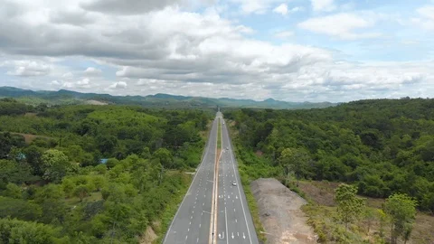 Asphalt road through mountain and forest Video stock 90927433
