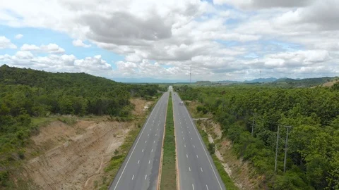 Asphalt road through mountain and forest Video stock 90927766
