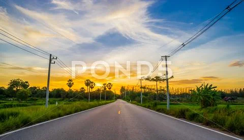 Asphalt road on twilight Stock Photos