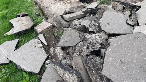 An asphalt road is under reconstruction Stock Footage 240044047