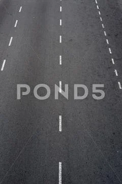 Asphalt road with white lines Stock Photos