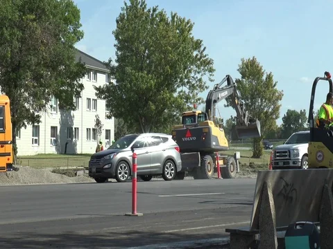 Asphalt Roller with Heavy Lifter in Background 스톡 동영상 80207022
