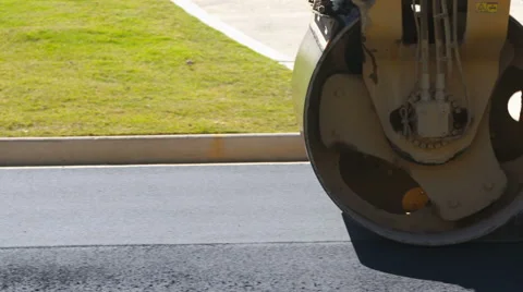 Asphalt Roller Smooths Pavement Drive Left Stock Footage 68650703