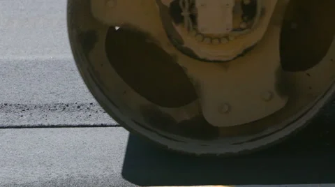 Asphalt Roller Smooths the Seam in Pavement Drive Left Stock Footage 68650959
