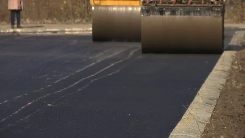 Asphalt rollers at work Stock Footage 82693949