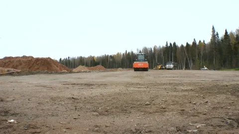 Asphalt rolling machine. Construction of a new road Stock Footage 95187671