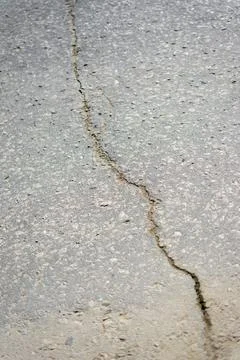 Asphalt texture. Cracked asphalt road surface texture. Stock-Fotos