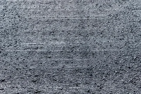 Asphalt texture from the final paving Stock Photos