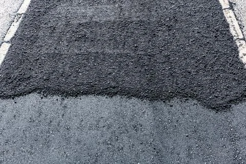 Asphalt texture from the final paving Stock Photos